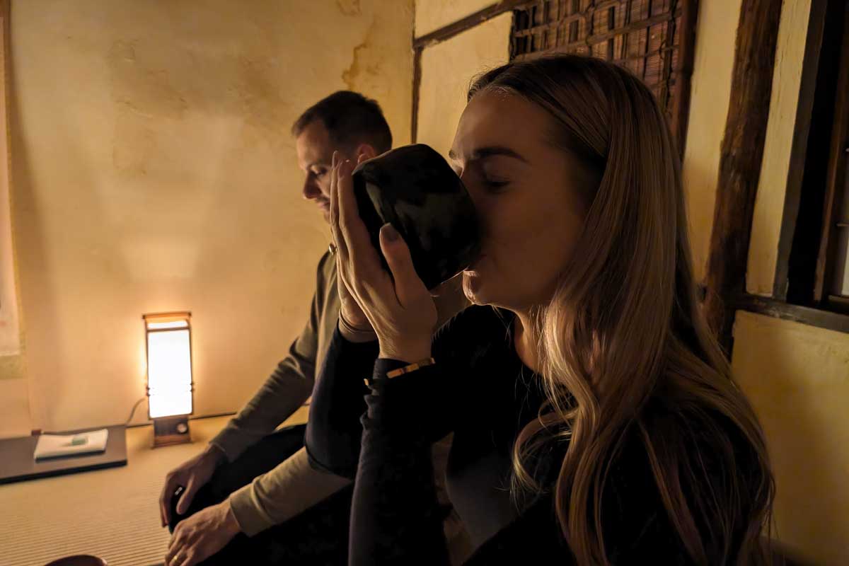 Bailey drinks tea at a Tea Ceremony & Making Experience in Hakone Japan
