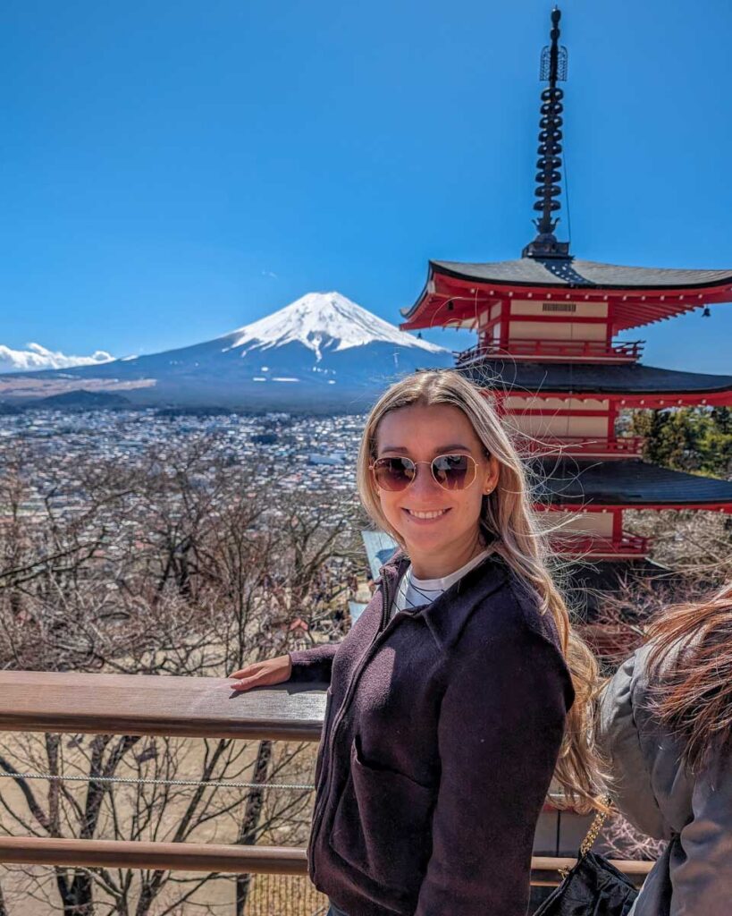 Bailey smiles at the Chureito Pagoda with Mt Fuji in the background Japan