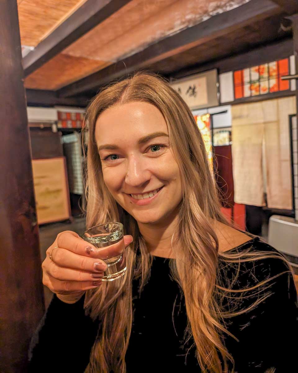 Bailey-drinks-sake-on-a-tour in Kobe-Japan