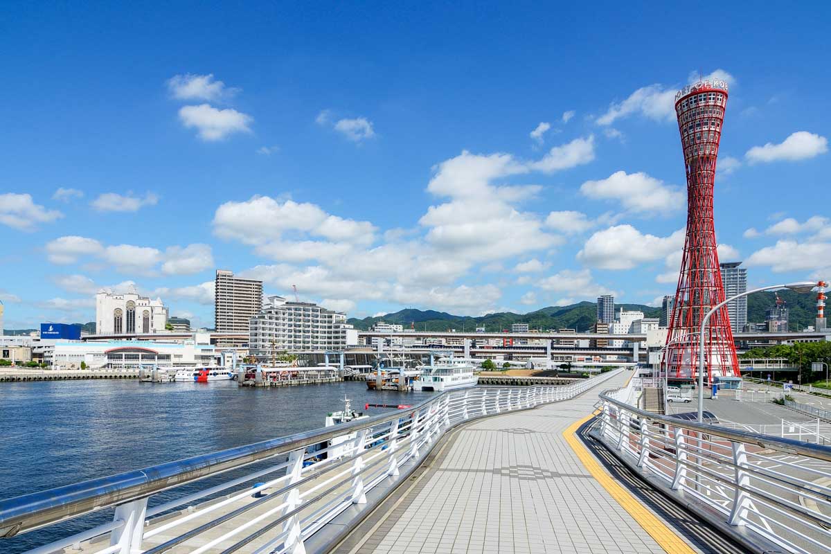 Walking along Harborland with Kobe Port Tower on the right Kobe Japan