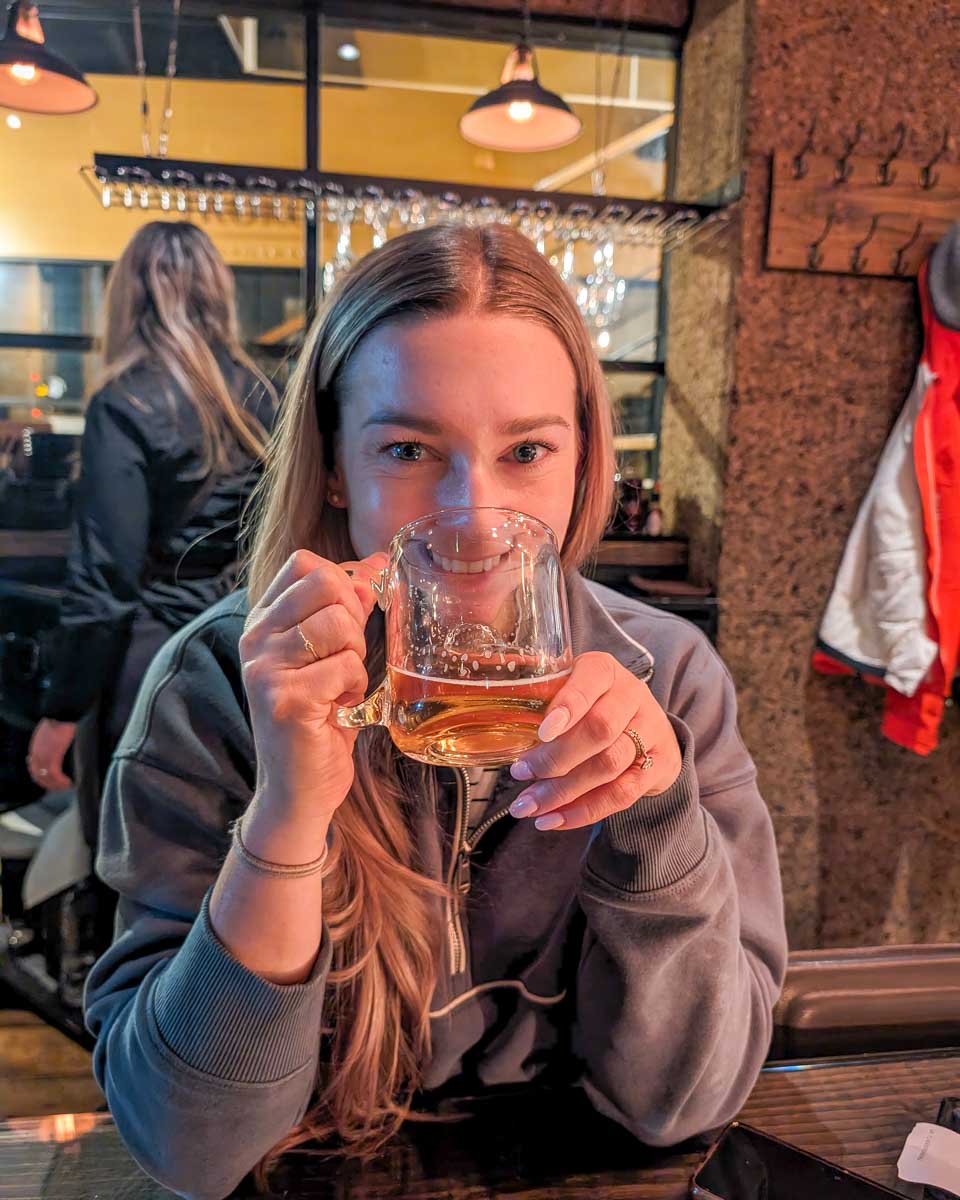 Bailey-drinks-beer-in Niseko-Japan