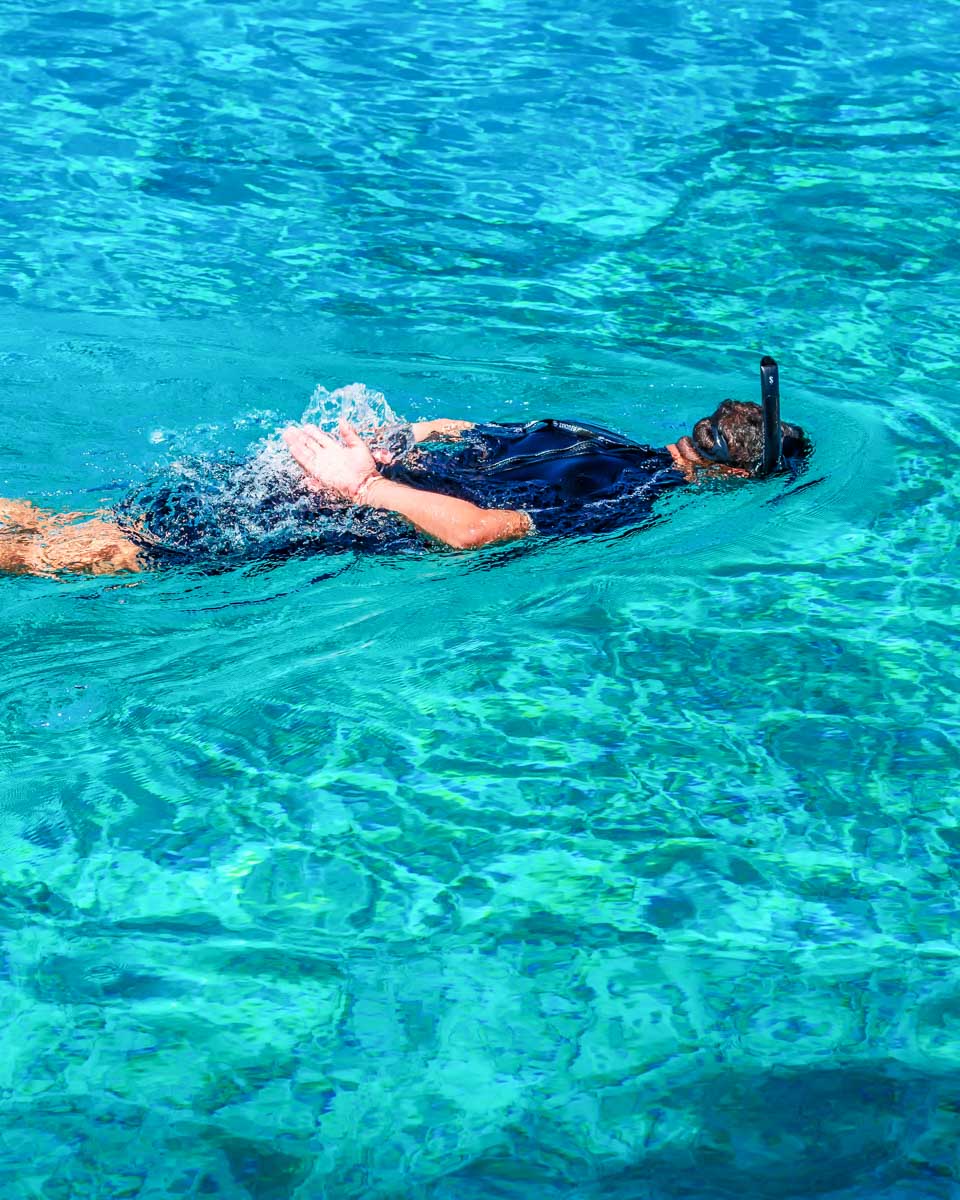 Daniel-snorkels-in-the-water-on a tour from Okinawa Japan