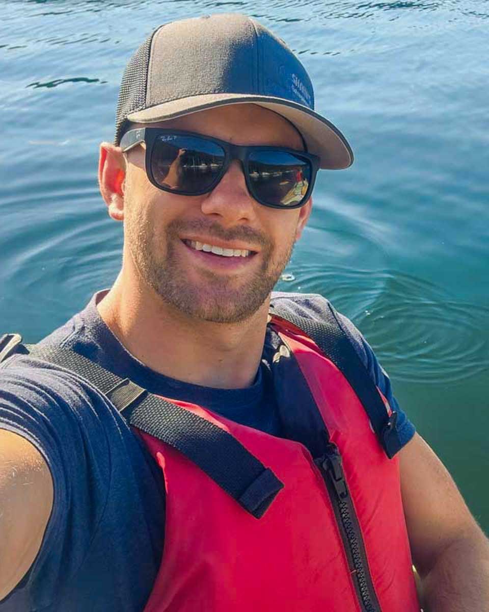 Daniel-takes-a-selfie-while-kayaking-on-a tour from Okinawa Japan