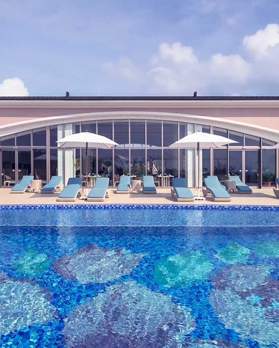 The outdoor pool area at Seawood Hotel Miyakojima