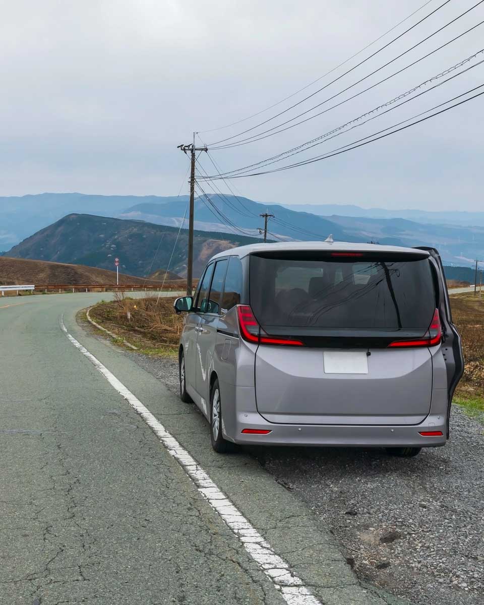 A rental van on the side of the road in Japan