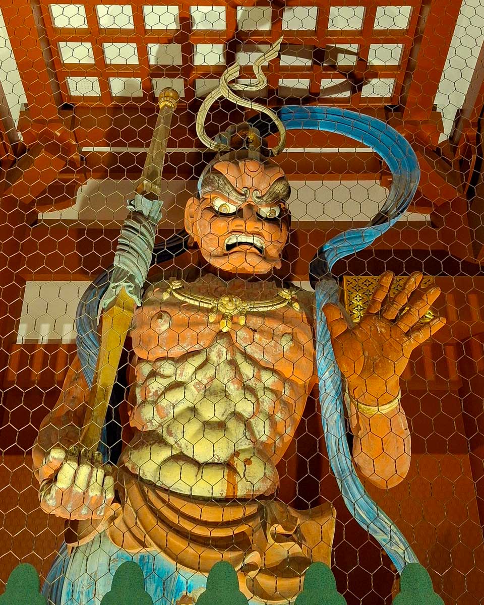 A-statue-at-the-Senso-ji-Temple-Kaminari-mon-Gate-in-Asakusa Tokyo-Japan