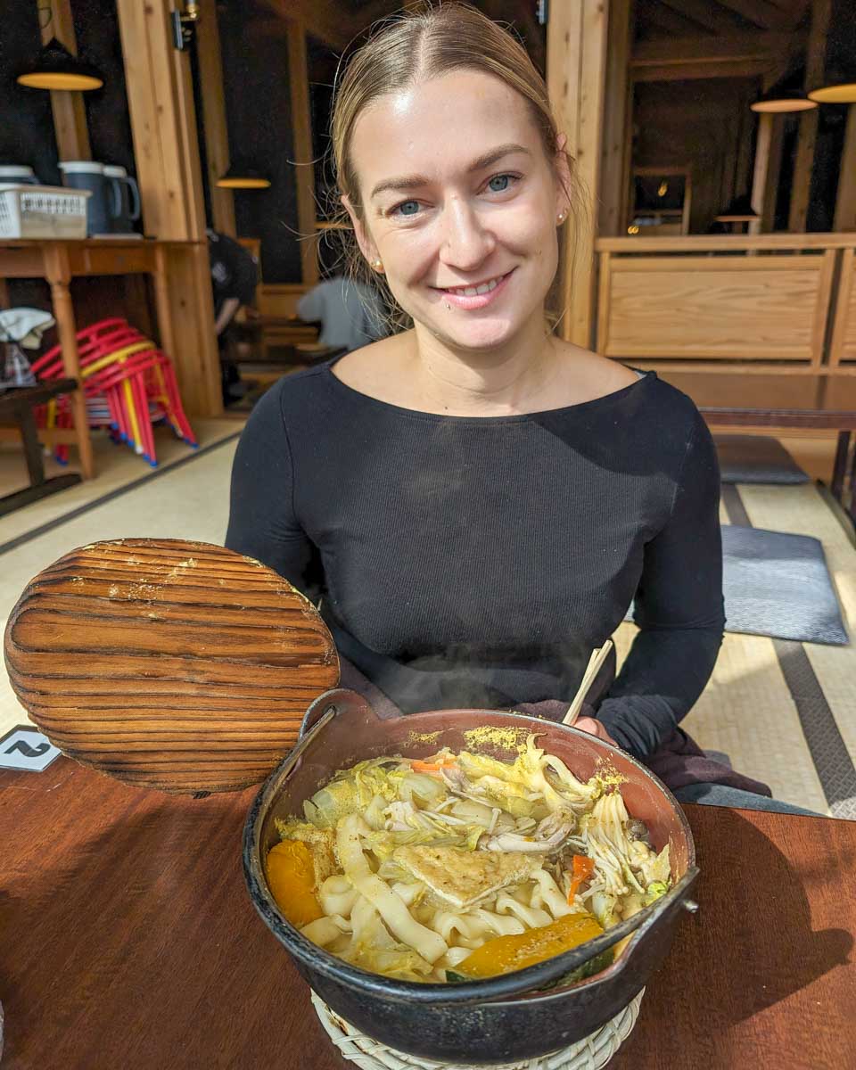 Bailey-eats-udon-noodles-in Kanazawa Japan