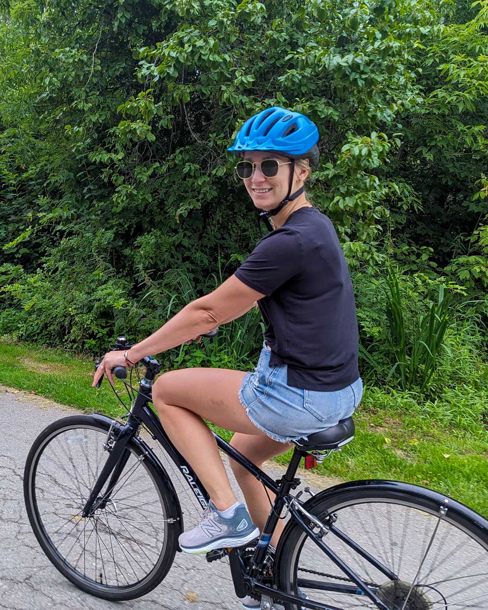 Bailey-rides-a-bike-on-a-tour-in-Japan