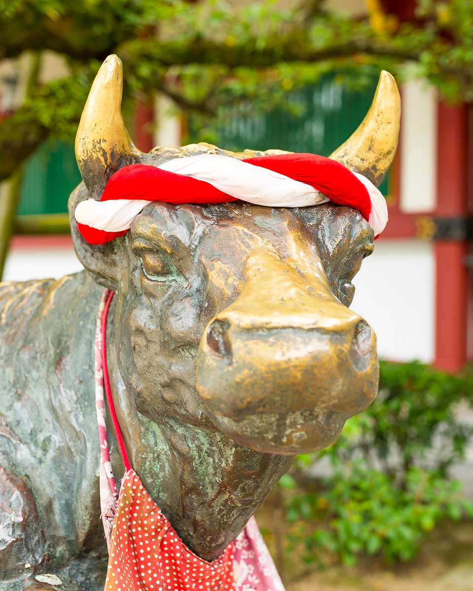 Bull statue in Dazaifu Tenmangu Shrine seen on a tour from Fukuoka Japan