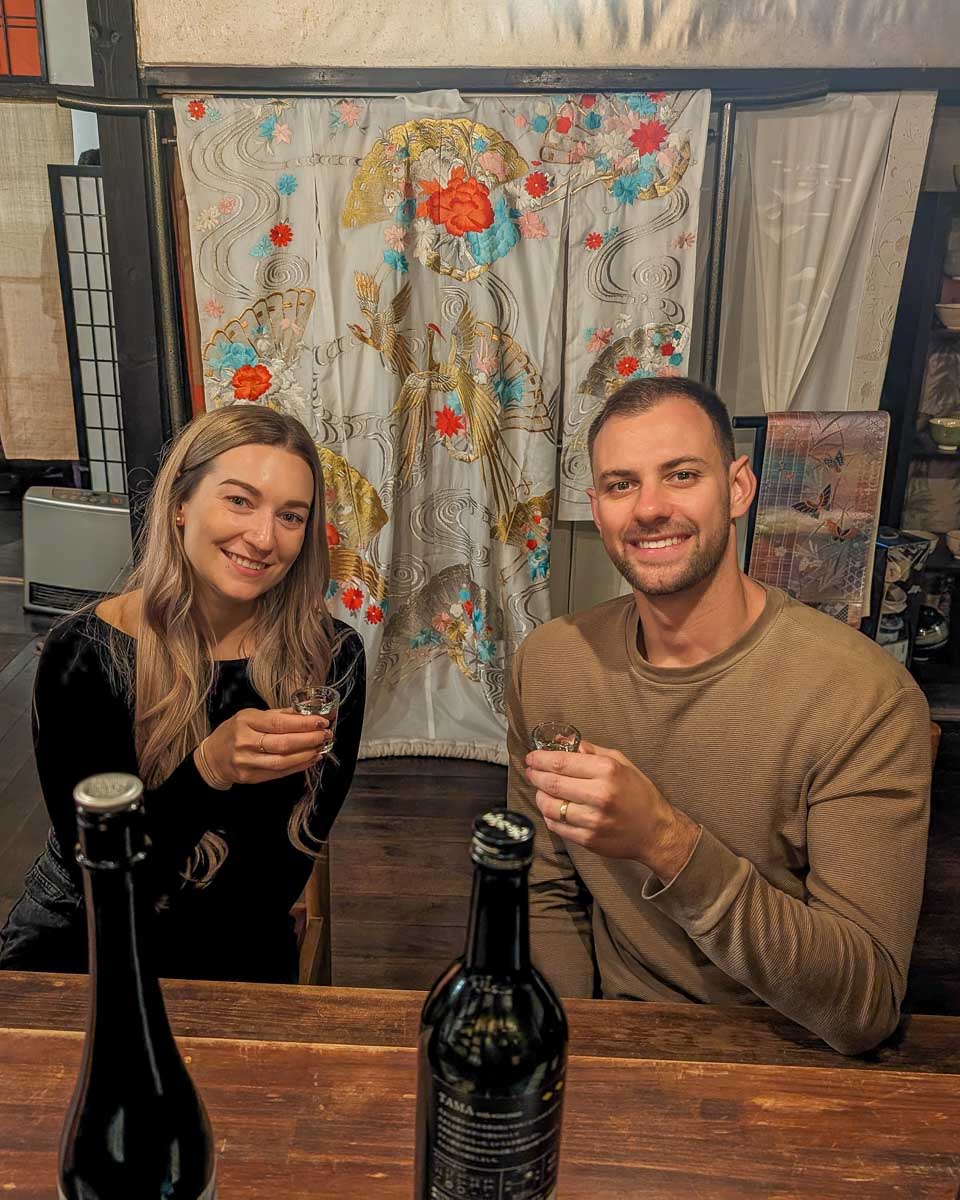 Daniel-and-Bailey-drink-sake-on-a-tour-in-Kobe-Japan