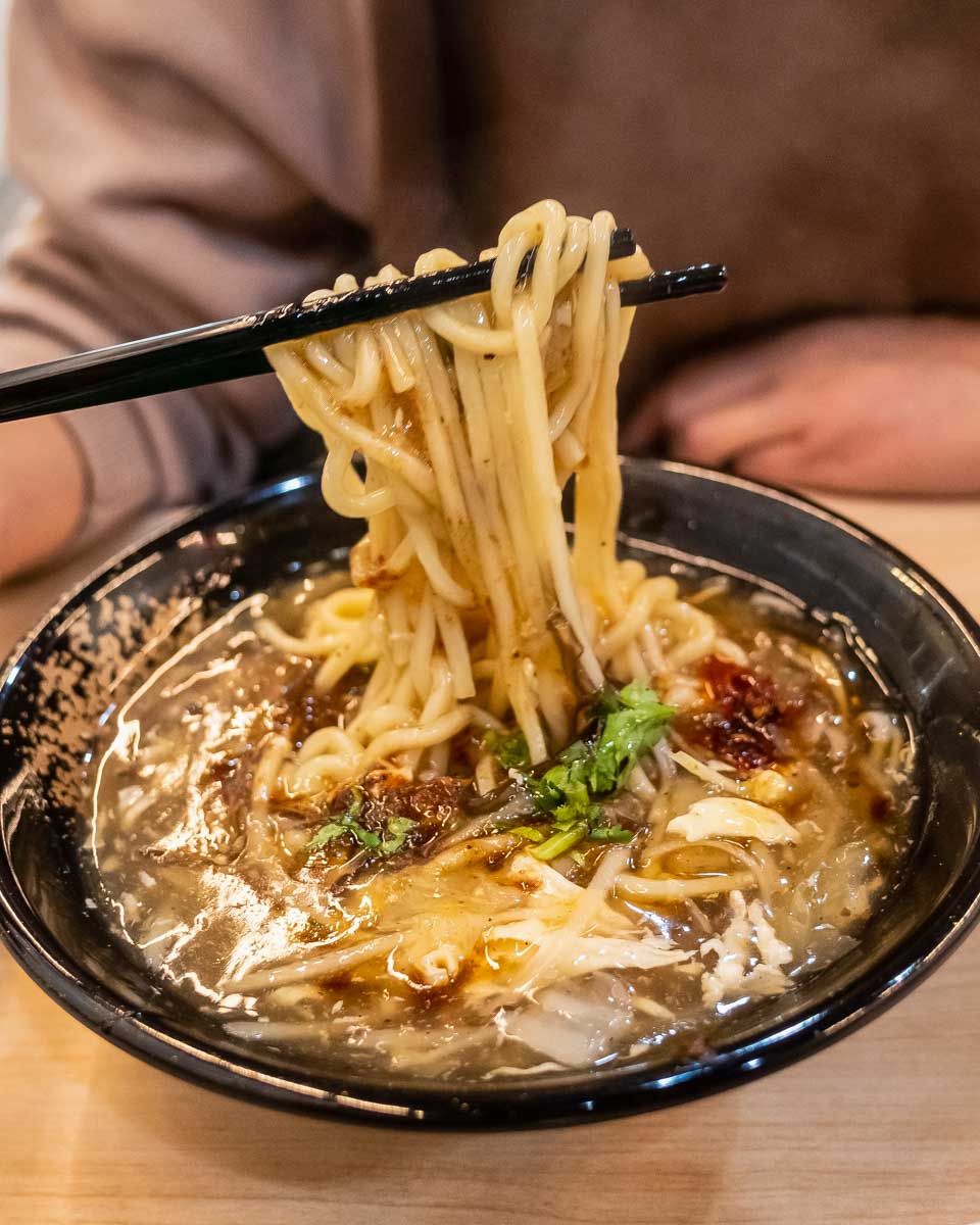Daniel eats ramen in Lake Kawaguchi Japan