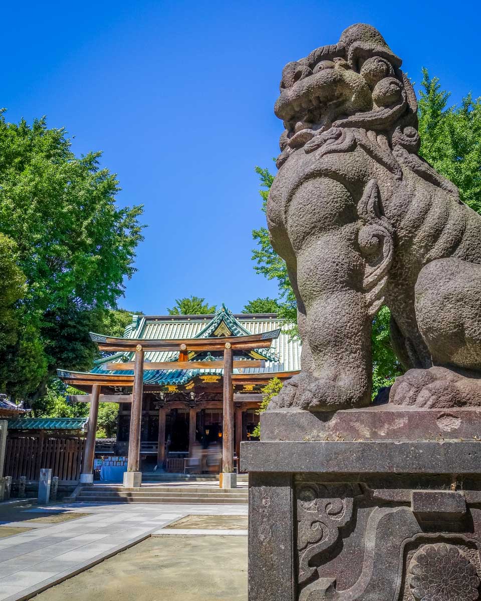 Lion statue in Ushijima Shrine temple, Asakusa Tokyo, Japan