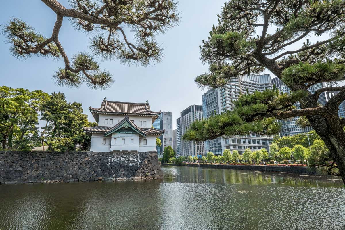 Looking at the moat of the Imperial Palace in Tokyo Japan
