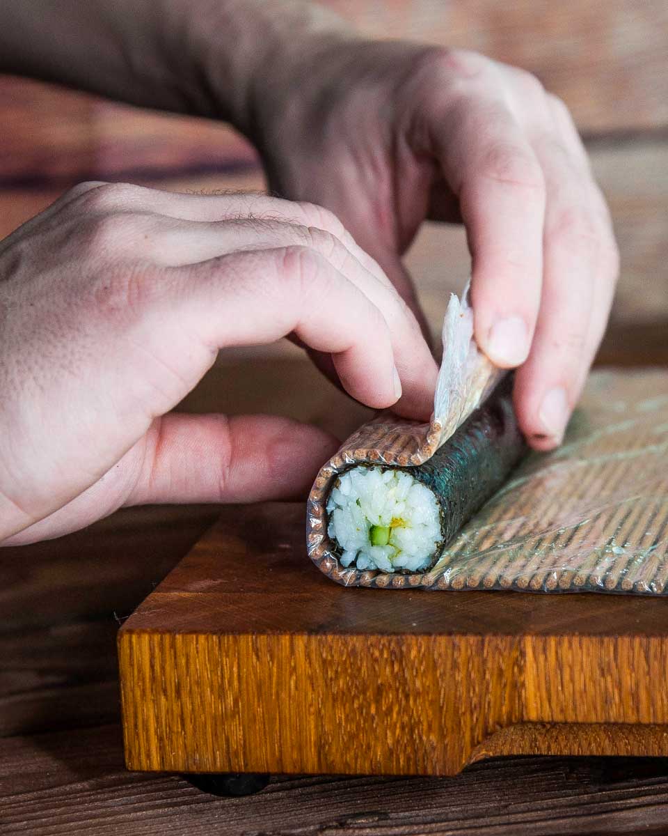 Person-making-sushi-during-a-cooking-class-in-Takayama-Japan