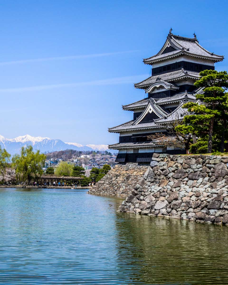 Stunning Matsumoto castle with japanese Alps in the background