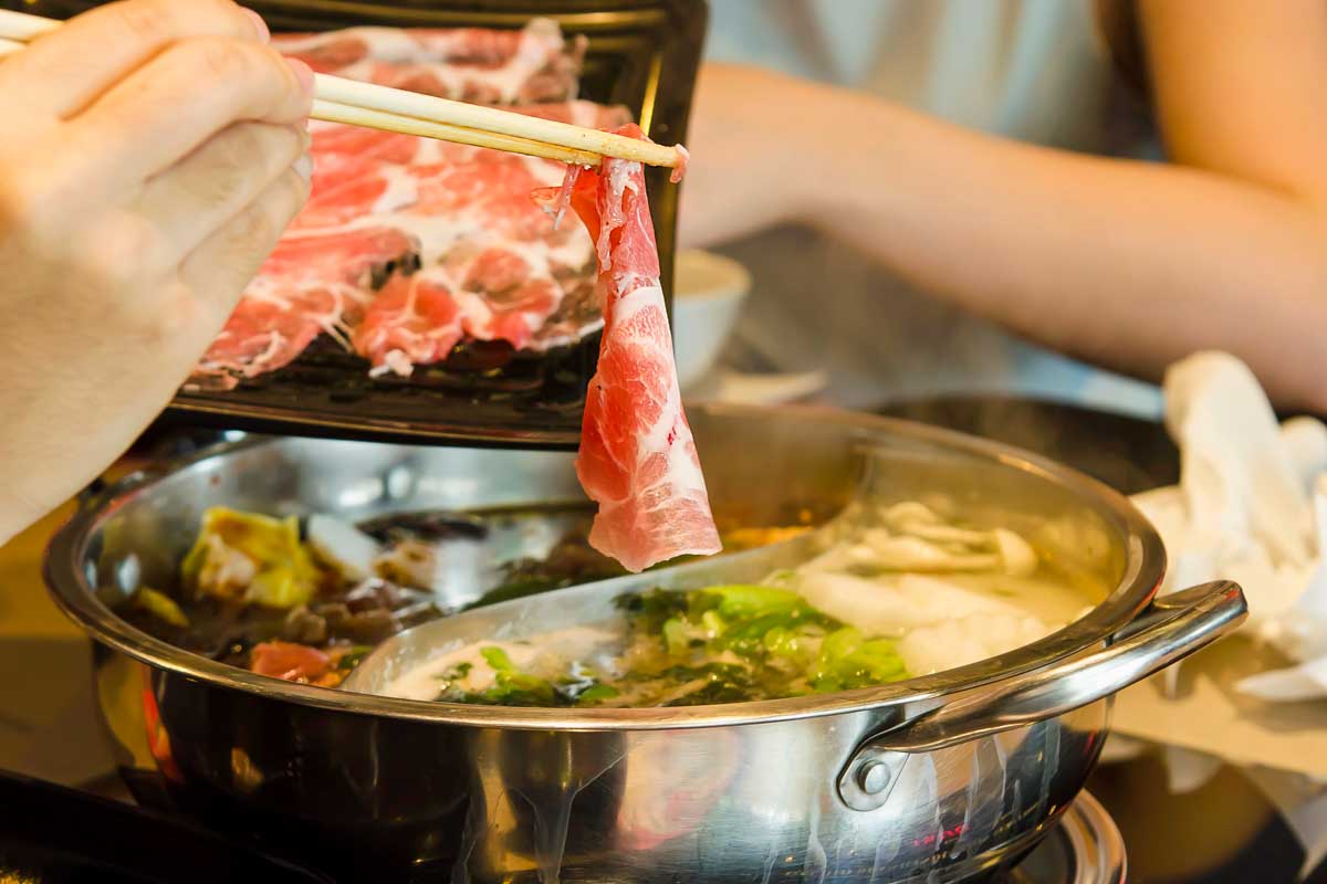 Sukiyaki being cooked in Tokyo Japan