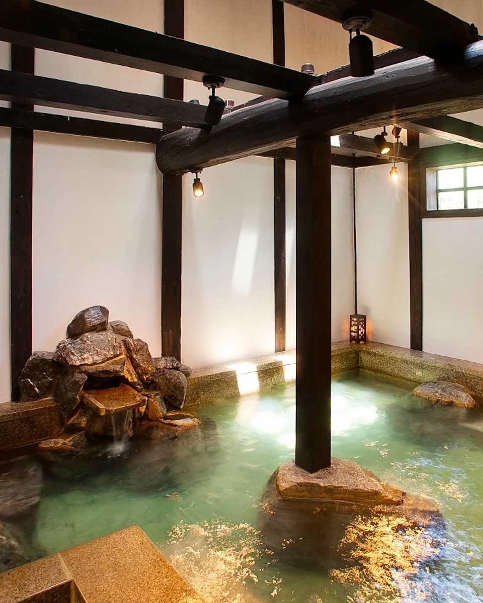 The indoor onsen at Honjin Hiranoya Kachoan in Takayama Japan copy