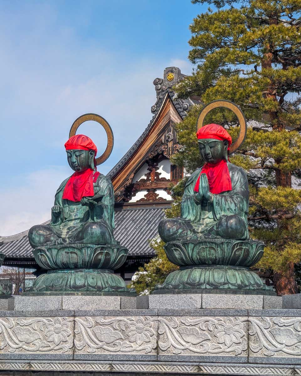 Zenkoji Temple seen in Nagano Japan with bronze statues