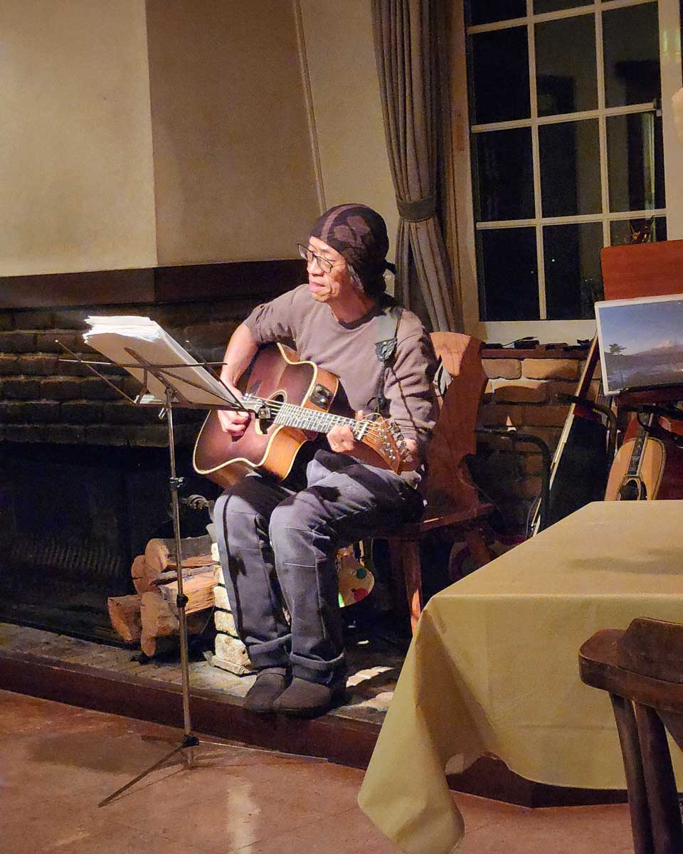 A local man plays guitar in Japan