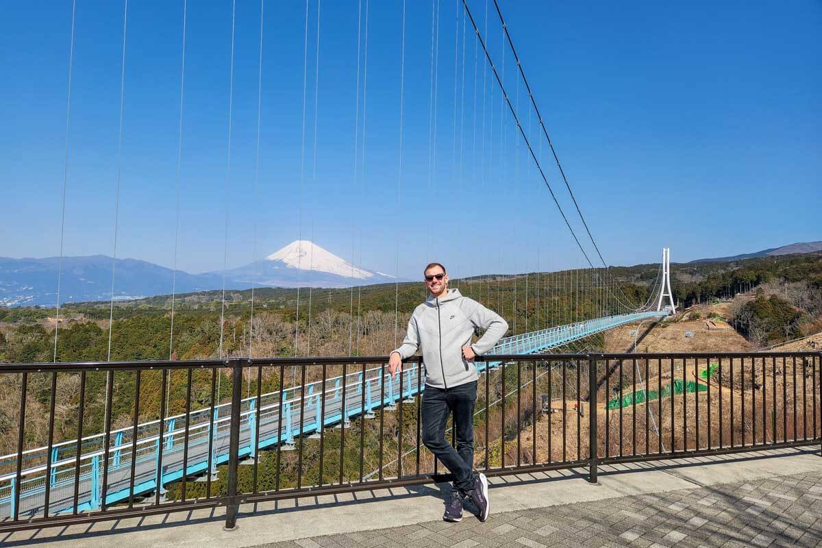 Daniel dresses appropriately with view of Fuji in background Japan