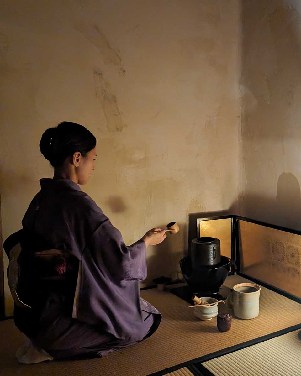 A-woman-doing-a-tea-ceremony-in-Yokohama Japan